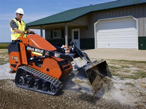 can a mini skid steer dig|mini skid dirt transfer.